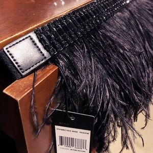 Never-worn, one size stylish feather belt
